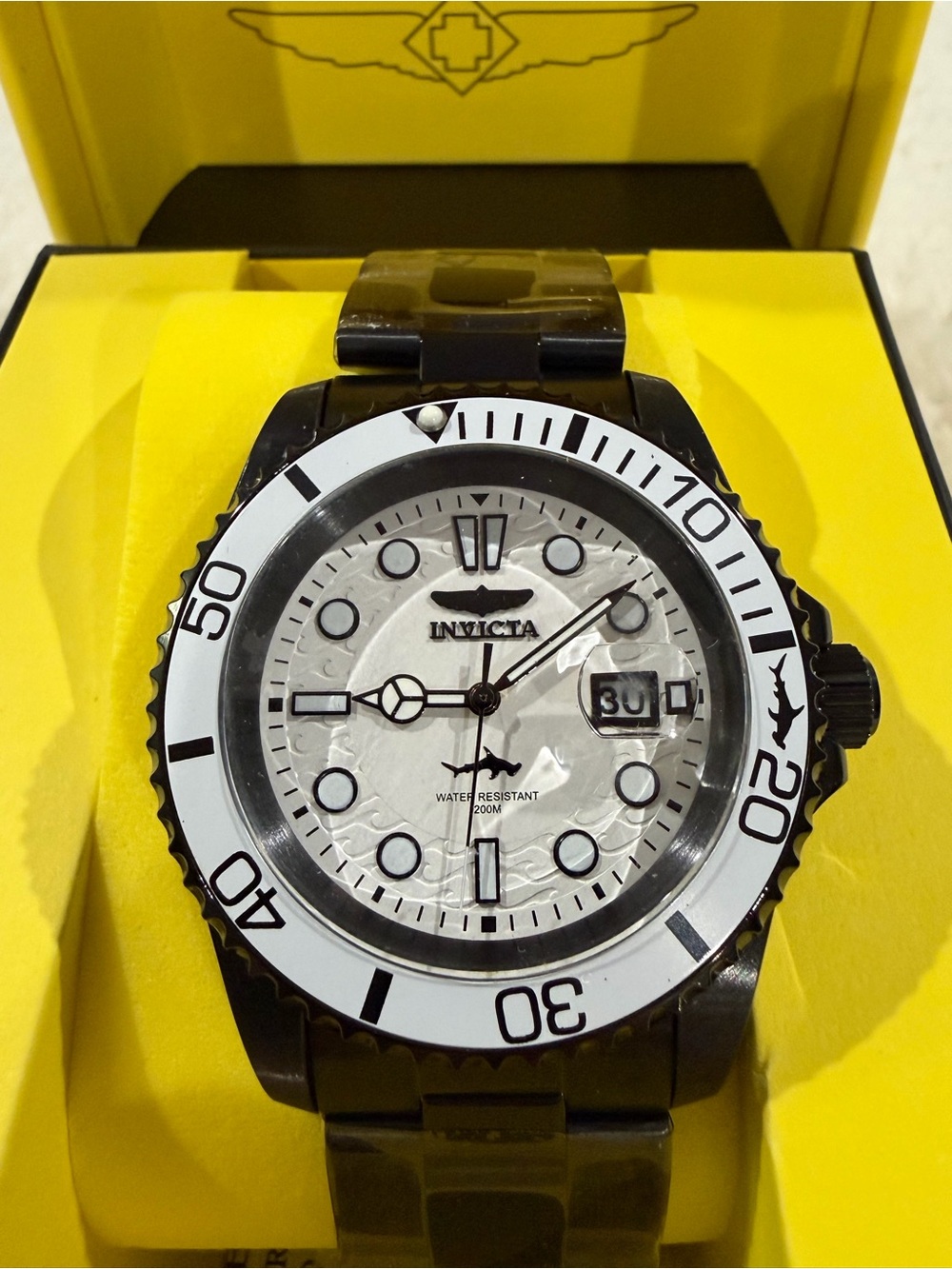 Invicta Black and White Diver-Style Watch with Textured White Dial